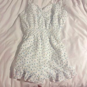 white and blue floral romper size small